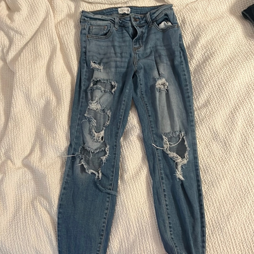 Light wash Cello jeans with holes size 5